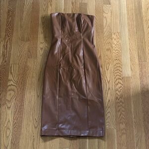 Brown faux leather strapless below the knee dress with small slit in the back